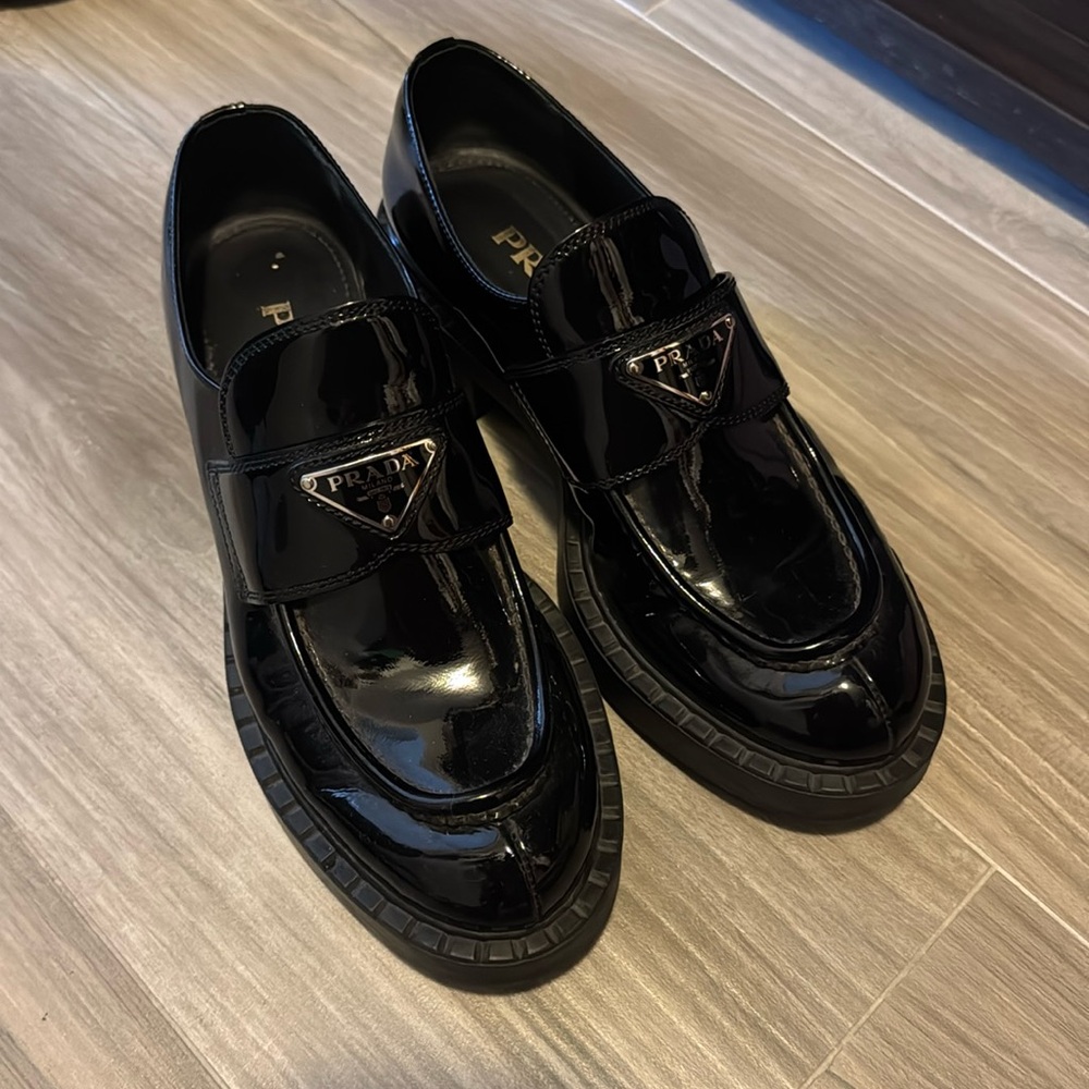 Authentic women’s Prada black patent leather loafers size 37.5